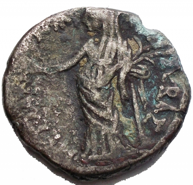reverse: Impero Romano - Claudius (41-54 AD). Billon Tetradrachm (25,5 mm - 9,93 g), Egpyt, Alexandria. Dated year 6 (45/46 AD). Obv. TI KAVI KAI EBA EPMANI AVTOK, Laureate head of Claudius to right; L (date) to right. Rev. MEAINA KAI EBA, Messalina standing half-left, leaning on column, holding two grain-ears and figures of two children. Geissen 88; RPC 5164. aVF.