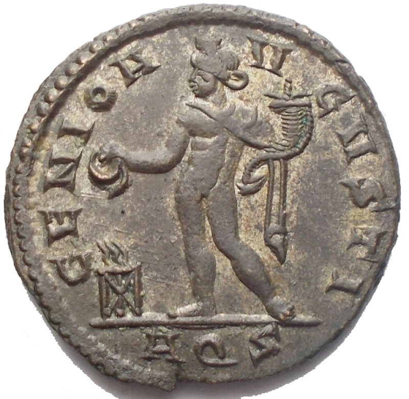 reverse: Impero Romano - Maximinus II Daia. Aquileia. 309-313 d.C. Follis. D / IMP MAXIMINVS PF AVG Head to the right. R / GENIO AVGVSTI Genius standing on the left with cornucopia and patera, at his feet tripod. In esergo AQS. RIC VI 130. Weight 4.27 gr. Diameter 21.54 mm. aEF. Argentatura. Rare.
