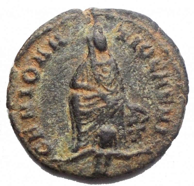 obverse: Impero Romano - Time of Maximinus II 16.  Persecution Issue . Antioch, AD 310-313. GENIO ANTIOCHENI, Tyche seated facing, river-god Orontes swimming below / APOLLONI SANCTO, Apollo standing left, holding patera and lyre; G in right field, SMA in exergue. 1.41g, 16.02mm Good Very Fine. Rare.
An active campaign of persecution against local Christians by Maximinus II reached its height during 310-313 the eastern cities in Nicomedia, Antioch, and Alexandria. Christians were subject to confiscation of land and property, and expelled from the cities; Churches were closed and ransacked. These three major mint cities struck a series of small bronzes honoring the old Greco-Roman gods - Jupiter, Apollo, Tyche, and Serapis among them. The persecutions subsided in AD 313 as a result of the Edict of Milan, jointly issued by Constantine and Licinius - the senior emperors - which proclaimed a policy of religious freedom, and returned confiscated property to the Christians.