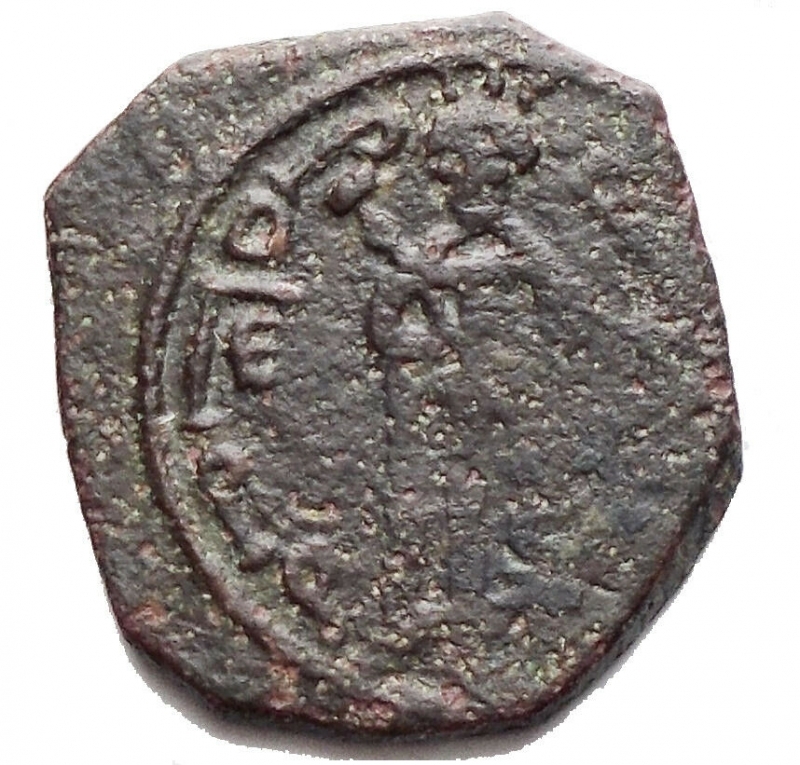 obverse: Zecche Italiane - Messina Ruggero II (1105-1154) 1/2 Follaro. D/ Re in piedi volto a sinistra. R/ Croce, IC/XC/NI/KA. Sp.78. g 1,48. AE.BB+

