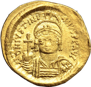 obverse: Justinian I (527-565).  AV Solidus, Constantinople mint. Obv. DN IVSTINIANVS PP AVG. Helmeted and cuirassed bust facing, holding globus cruciger and shield. Rev. VICTORIA AVGGG Z. Angel standing facing, holding long staff surmounted by simplified Christogram and globus cruciger; in exergue, CONOB. D.O. 9. Sear 140. AV. g. 4.43  mm. 21.50   Minor area of flatness on obverse, otherwise about EF/EF. 