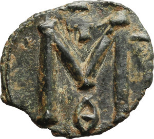reverse: Michael II, the Amorian (820-829).  AE Follis, Syracuse mint. Obv. Facing busts of Michael and his son Theophilus. Rev. Large M, cross above, Θ beneath. D.O. 21. Sear 1652. AE. g. 2.33  mm. 20.00   Nice glossy dark green patina. About EF. 