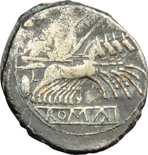 reverse: Anonymous.  AR Debased Quadrigatus, 225-215 BC. Obv. Laureate head of Janus. Rev. Jupiter in quadriga driven by Victory right; below, ROMA in relief in linear frame. Cr. 28/3. Syd. 68. AR. g. 5.36  mm. 20.00   Toned, with golden hues. Areas of flatness, otherwise VF. 