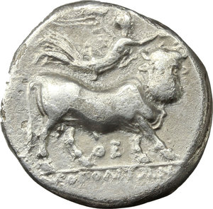 reverse: Italy. Central and Southern Campania, Neapolis.   AR Didrachm, c. 300-275 BC. Obv. Female head right, behind, astragalos; below, APTEMI. Rev. Man-faced bull right, crowned by Nike; below, ΘE; in exergue, NEOΠOΛITΩN. Sambon 463. HN Italy 579. AR. g. 7.06  mm. 20.00    Good VF.