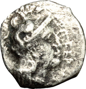 obverse: Italy. Northern Apulia, Arpi.   AR Diobol, 325-275 BC. Obv. Head of Athena right, wearing Attic helmet decorated with hippocamp; before, APΠ CEPTI. Rev. Herakles right, holding club and fighting lion; above, traces of ethnic. HN Italy 637. SNG ANS 632. AR. g. 0.91  mm. 12.00  R. Rare. Uncleaned black deposits. About VF.