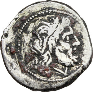 obverse: Anonymous.  AR Victoriatus, from 211 BC. Obv. Laureate head of Jupiter right. Rev. Victory right crowning trophy; in exergue, [ROMA]. Cr. 53/1. AR. g. 3.09  mm. 17.50   Dark encrustations and oxidations on reverse. F.