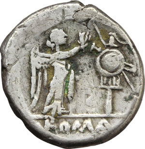 reverse: Anonymous.  AR Victoriatus, 179-170 BC. Obv. Laureate head of Jupiter right. Rev. Victory right crowning trophy; in exergue, ROMA. Cr. 166/1. AR. g. 2.64  mm. 16.00    VF.