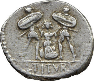reverse: L. Titurius L. f. Sabinus.  AR Denarius, 89 BC. Obv. SABIN. Head of King Tatius right; below chin, palm. Rev. Tarpeia standing facing between two soldiers, who are about to kill her; in upper central field, star and crescent. In exergue, L. TITVRI. Cr. 344/2b. B. 4. AR. g. 3.55  mm. 19.00   Lightly toned. Good VF.