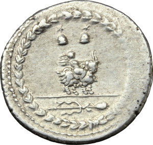reverse: Mn. Fonteius C. f.  AR Denarius, 85 BC. Obv. Laureate head of Vejovis right, MN. FONTEI. C.F behind, thunderbolt below head, monogram of ROMA below chin. Rev. Infant winged Genius seated on goat right; above, caps of the Dioscuri and below, thyrsus. All within laurel wreath. Cr. 353/1a. B. 9. AR. g. 3.98  mm. 20.50   Struck on a broad flan, brilliant and lightly toned. EF.
