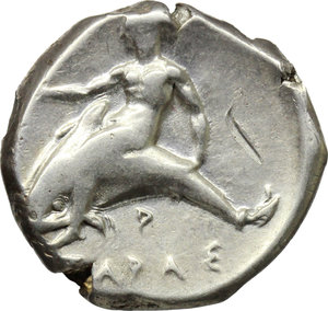 reverse: Italy. Southern Apulia, Tarentum.   AR Nomos, c. 380-340 BC. Obv. Nude youth on horseback left, placing wreath on horse s head;  below horse, palladium. Rev. TAPAΣ. Taras astride dolphin left, holding kantharos (?) in extended right hand; below dolphin, P. HN Italy 875. SNG Fitzwilliam 258. Vlasto 425. SNG ANS 918. AR. g. 7.79  mm. 20.90   Scratch on rev.  VF.