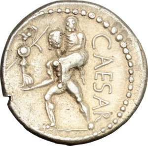 reverse: Julius Caesar.  AR Denarius, 47-46 BC. Obv. Diademed head of Venus right. Rev. CAESAR. Aeneas advancing left, carrying palladium in right hand and Anchises on left shoulder. Cr. 458/1. AR. g. 3.80  mm. 17.50   A nice example, lightly toned with golden hues. Minor test cut on edge, at nine o clock of obverse and almost invisible banker s mark on obverse, otherwise about EF.