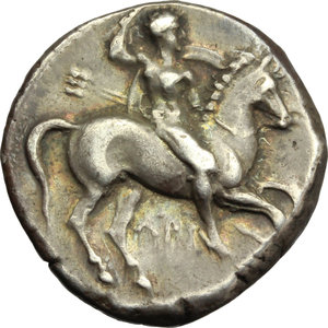 obverse: Italy. Southern Apulia, Tarentum.   AR Nomos, c. 332-302 BC. Obv. Warrior, holding shield and two spears, preparing to cast a third, on horseback right, behind, Ξ; below, API. Rev. TAPAΣ. Phalantos, holding kantharos and rudder, riding dolphin left; below, KΛ. Vlasto 647. SNG ANS-. HN Italy 939. AR. g. 7.84  mm. 22.00   A superb example, well centred on a broad flan. Enchanting light cabinet tone, with iridescent hues. About EF/Good VF.