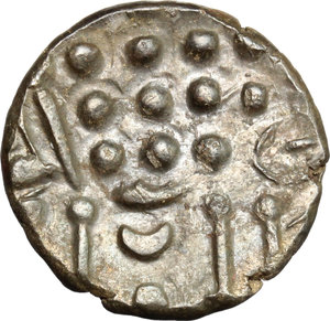 reverse: Celtic Coinage. Celtic Britain, Durotriges.   AR Stater, c. 65 BC-45 AD. Obv. Devolved head of Apollo right. Rev. Disjonted horse left; pellets above, pellet in lozenge above tail. Cf. Van Arsdell 1235-1. AR. g. 3.75  mm. 15.50   A very attractive and well centred example. Superb old cabinet tone, with iridescent hues. About EF.