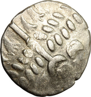 obverse: Celtic Coinage. Celtic Britain, Durotriges.   AR Stater, c. 65 BC-45 AD. Obv. Devolved head of Apollo right. Rev. Disjonted horse left; pellets above, pellet in lozenge above tail. Cf. Van Arsdell 1235-1. AR. g. 4.05  mm. 20.50   Minor porosity. Prettily toned. VF.