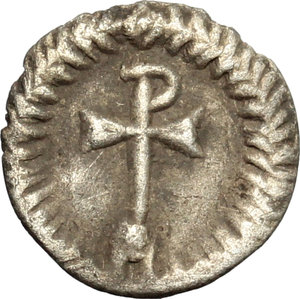 reverse: Justinian I (527-565).  AR 1/4 Siliqua, Ravenna mint. Obv. DN IVSTINIANVS. Diademed and cuirassed bust right. Rev. Cross surmounted by P on globe, within wreath. DOC 341. Sear 322. Ranieri 365. AR. g. 0.38  mm. 10.00  RRR. Extremely rare. Good VF.