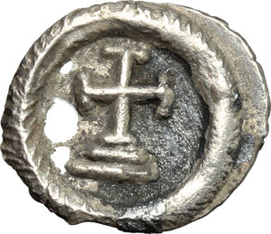reverse: Maurice Tiberius (582-602).  AR 1/4 Siliqua, Ravenna mint. Obv. DN mAV[...]TIB PP AV. Diademed and cuirassed bust right. Rev. Cross potent on two steps; all within wreath. DOC 288. Sear 593. Ranieri 483. AR. g. 0.37  mm. 11.00  RRR. Extremely rare. Metal flaws, otherwise good VF.