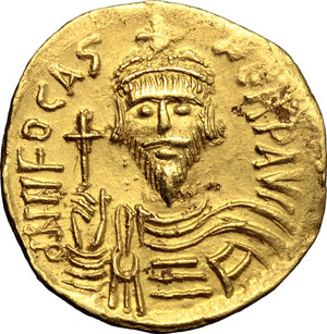 obverse: Phocas (602-610).  AV Solidus, Constantinople mint. Obv. d NN FOCAS PERP AVG. Draped and cuirassed bust facing, wearing crown and holding globus cruciger. Rev. VICTORIA AVGG A. Angel standing facing, holding staff sormonted by staurogram and globus cruciger; in exergue, CONOB. D.O. 10. Sear 620. AV. g. 4.38  mm. 20.00   A very attractive example. Minor areas of flatness, otherwise about EF.