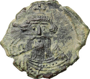 obverse: Constans II (641-668).  AE Follis, Syracuse mint. Obv. Bust facing, with long beard, wearing crown and chlamys, and holding globus cruciger. Rev. Large M; above, monogram 35; beneath, SCL. DOC 178. MIB 207. Sear 1107. AE. g. 4.74  mm. 24.00   Traces of over-striking. In excellent condition for the issue. Green-brown patina. About EF.