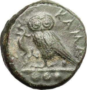 reverse: Sicily. Kamarina.   AE Tetras or Trionkion, c. 420-405 BC. Obv. Helmeted head of Athena left. Rev. Owl standing left, head facing, holding lizard; three pellets in exergue. CNS 33. AE. g. 3.25  mm. 15.00   Perfectly centred. EF.