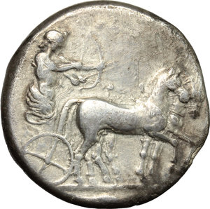 obverse: Sicily. Selinos.   AR Tetradrachm, c. 435-417 BC. Obv. ΣEΛINONTION. Apollo, holding bow, and Artemis in walking quadriga right; grain ear in exergue. Rev. River-god Selinos standing left, sacrificing from phiale over lighted altar and holding laurel branch; rooster on altar left, bull on basis and selinon leaf to right. BMC 2,31. AR. g. 16.67  mm. 27.00  RR.  VF.