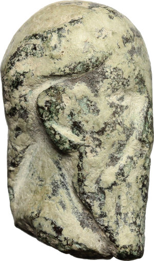 reverse: Bronze bearded head.  26 x 14 mm