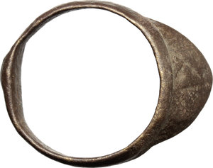 obverse: Bronze archer s ring (thumb ring).  Medieval, 13th-15th century.  34 mm. Size 23 mm