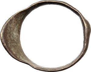 reverse: Bronze archer s ring (thumb ring).  Medieval, 13th-15th century.  34 mm. Size 23 mm