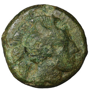 obverse: LUCANIA, Thourioi. 340 BC. Bronze. 5.35 gr. – 16.7 mm. O:\ Head of Athena right, in crested helmet decorated with Skylla holding a trident. R:\ ΘOYΡIΩN, bull butting left. BMC 129 var. VF+