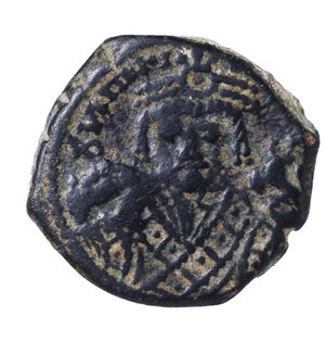 obverse: MAURICE TIBERIUS. 582-602 AD. AE HALF FOLLIS. 20 NUMMI. Mint of Theoupolis. 594 AD. 5,95 gr. - 19,40 mm. O:\ Bust facing, wearing crown with trefoil ornament, and consular robes; in right hand, mappa; in left eagle.tipped sceptre. R:\ Large K; above cross ; to left ANNO; to right XII. BMC 199-207, MIB 99A. XF