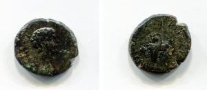 obverse: Caracalla (198-217), Moesia Inferiore, Nicopolis ad Istrum.  AE (3,27 gr. – 15 mm.). D.\: Bare headed and draped bust right. R.\: NIKOΠOΛIT ΠPROC ICTP. Basket containing fruits with bunch of grapes hanging on either side. Varbanov 2947. BB. R.