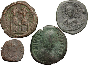 obverse: Byzantine Empire. Multiple lot of four (4) unclassified AE coins, including 3 Folles and a 16 Nummi