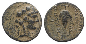 obverse: Seleukis and Pieria, Apameia, 1st century BC. Æ (14.5mm, 2.65g, 12h), year  239 (68/9 BC). Head of Dionysos r., wearing ivy wreath. R/ Grape bunch; ZΛΣ (date) to inner r.; monogram to outer l. HGC 9, 1433; Lindgren II 2035. Brown patina, VF