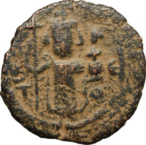 obverse: Arab-byzantine, Umayyad Caliphate, pre-reform coinage.. AE Fals, Emesa mint, 41-77 H / 661-697 AD