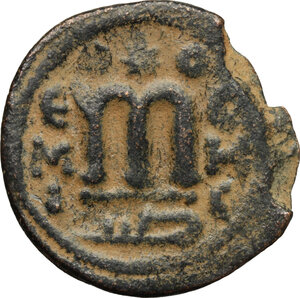 reverse: Arab-byzantine, Umayyad Caliphate, pre-reform coinage.. AE Fals, Emesa mint, 41-77 H / 661-697 AD