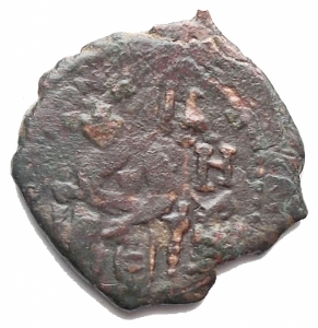 obverse: Zecche Italiane - Messina Ruggero II (1105-1154) 1/2 follaro.D/ Ruggero in trono. R/ Croce , nei quarti IC / XC /NI /KA. Gr. 1.48. AE. Sp.77. qBB