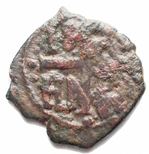reverse: Zecche Italiane - Messina Ruggero II (1105-1154) 1/2 follaro.D/ Ruggero in trono. R/ Croce , nei quarti IC / XC /NI /KA. Gr. 1.48. AE. Sp.77. qBB