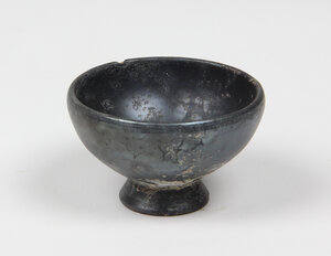 obverse: Greek black-glazed miniature cup.  4th century BC.  6.7 cm diameter, 4 cm height