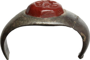 reverse: Silve ring with red jasper stone engraved with picture of Amor.  Roman period, 2nd-4th century.  Size 20 mm