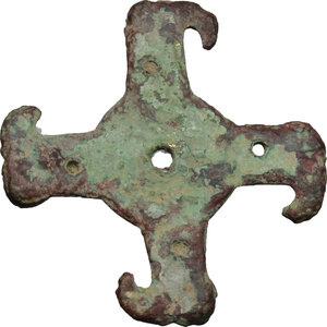 reverse: Gilt bronze  swastika  decorative element, the four corners decorated with eagles heads.  Migration period, 5th-7th century AD.  37 x 37 mm