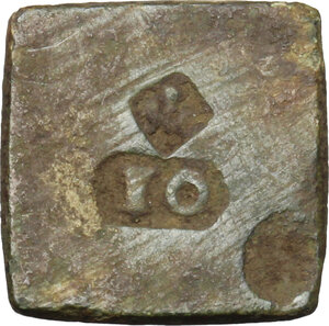 reverse: AE Coin weight, with monogram and punch-marks.  Medieval period, 11th-15th century.  Diameter 15,5 mm. Weight 3,76 g