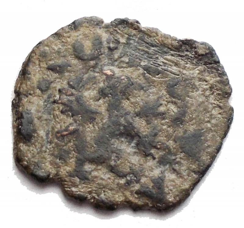 obverse: Zecche Italiane - Genova. Repubblica. 1139-1339.Quartaro. AE. Peso gr. 0.81.BB.Patina.RR.