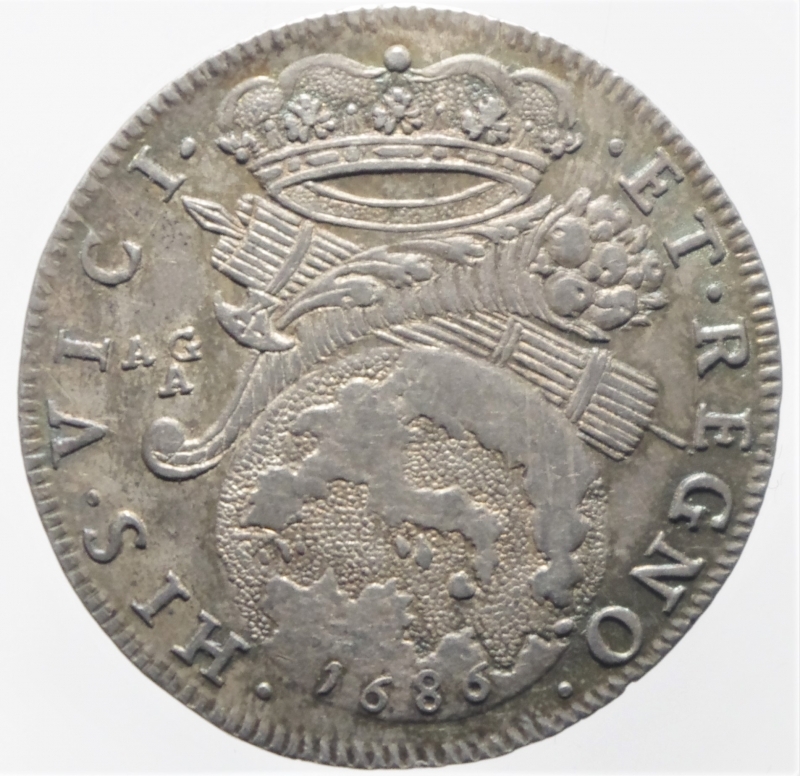 obverse: Zecche Italiane. Napoli. Carlo II. 1674-1700. AG. Tar 1686. P/R 13 MIR 298/5.Peso 6,00 gr. SPL. Patina iridescente.
