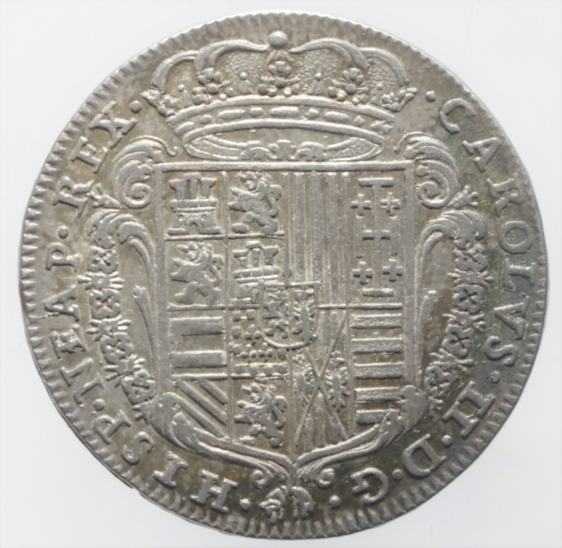 reverse: Zecche Italiane. Napoli. Carlo II. 1674-1700. AG. Tar 1686. P/R 13 MIR 298/5.Peso 6,00 gr. SPL. Patina iridescente.