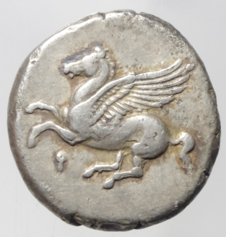 obverse: Mondo Greco. Corintia.Corinto.Statere.375-300 a.C. D/ Pegaso in volo a s. sotto Ϙ R/ Testa di Athena a s. davanti , dietro I e Artemide in corsa a s. con torcia. Calciati 453. Peso 8,29g. Diametro 20mm.BB