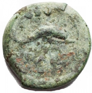 reverse: Varie. Paestum. After 180 BC. Æ Quadrans (4,26 gm). Head of Poseidon right; three pellets behind / Dolphin right; three pellets above. SNG ANS 740. VF Green patina. 