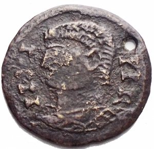 obverse: Monete Barbariche - IV Sec dC. Imitazione barbarica di bronzetto Romano. gr 1,44. mm 17,12. Forellino di sospensione