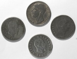 obverse: Casa Savoia. Lotto di 4 monete. Falsi d epoca. 2 Lire 1863 Stemma Napoli e Torino, 2 Lire 1899 e 10 Lire 1927. MB. 