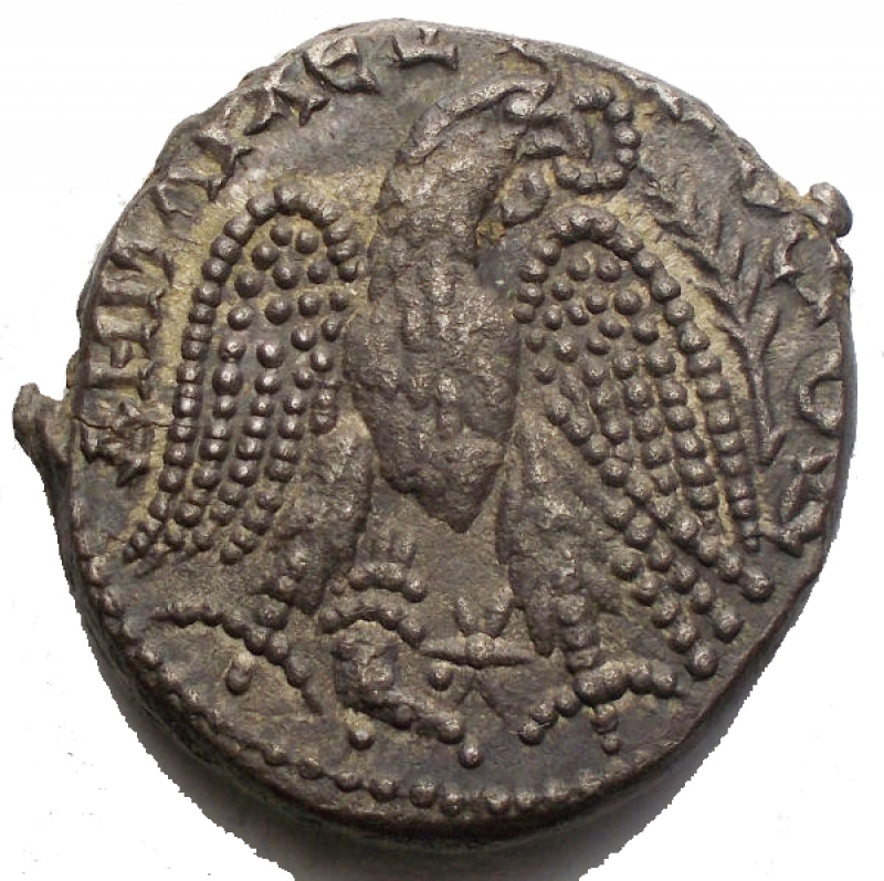 reverse: SYRIA, Seleucis and Pieria. Antioch. Caracalla. 198-217 AD. AR Tetradrachm (12.7 gm). Dated COS 4 (215-217 AD). Laureate head right / Eagle with dotted wings standing facing, head right, wreath in beak; cornucopiae and star below. Prieur 244. Mint State. Toned. 