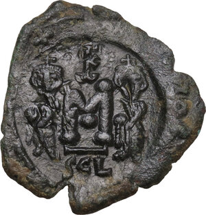 reverse: Constans II, with Constantine IV, Heraclius, and Tiberius (641-668). . AE Follis. Syracuse mint, 659-668