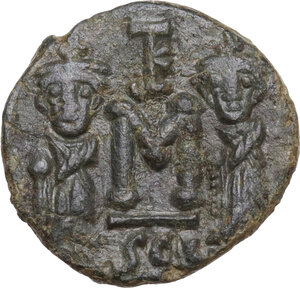 reverse: Constans II, with Constantine IV, Heraclius, and Tiberius (641-668). . AE Follis. Syracuse mint, 659-668